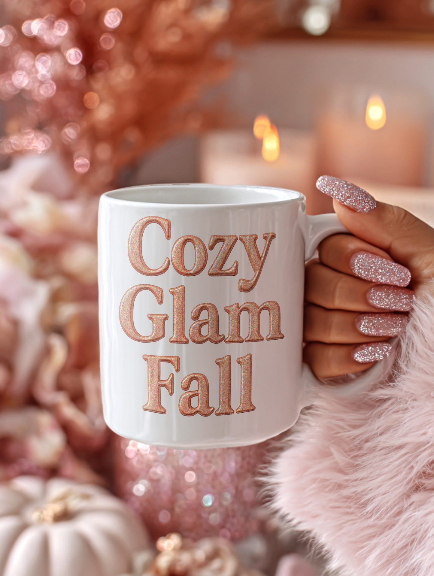 Hand holding a mug with 'Cozy Glam Fall' text against a festive background.