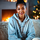 Blue hoodie mockup PNG 300 DPI in cozy lifestyle setting – Dazzle Darling