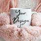 White mug with 'Your Design It' text on a fluffy pink surface