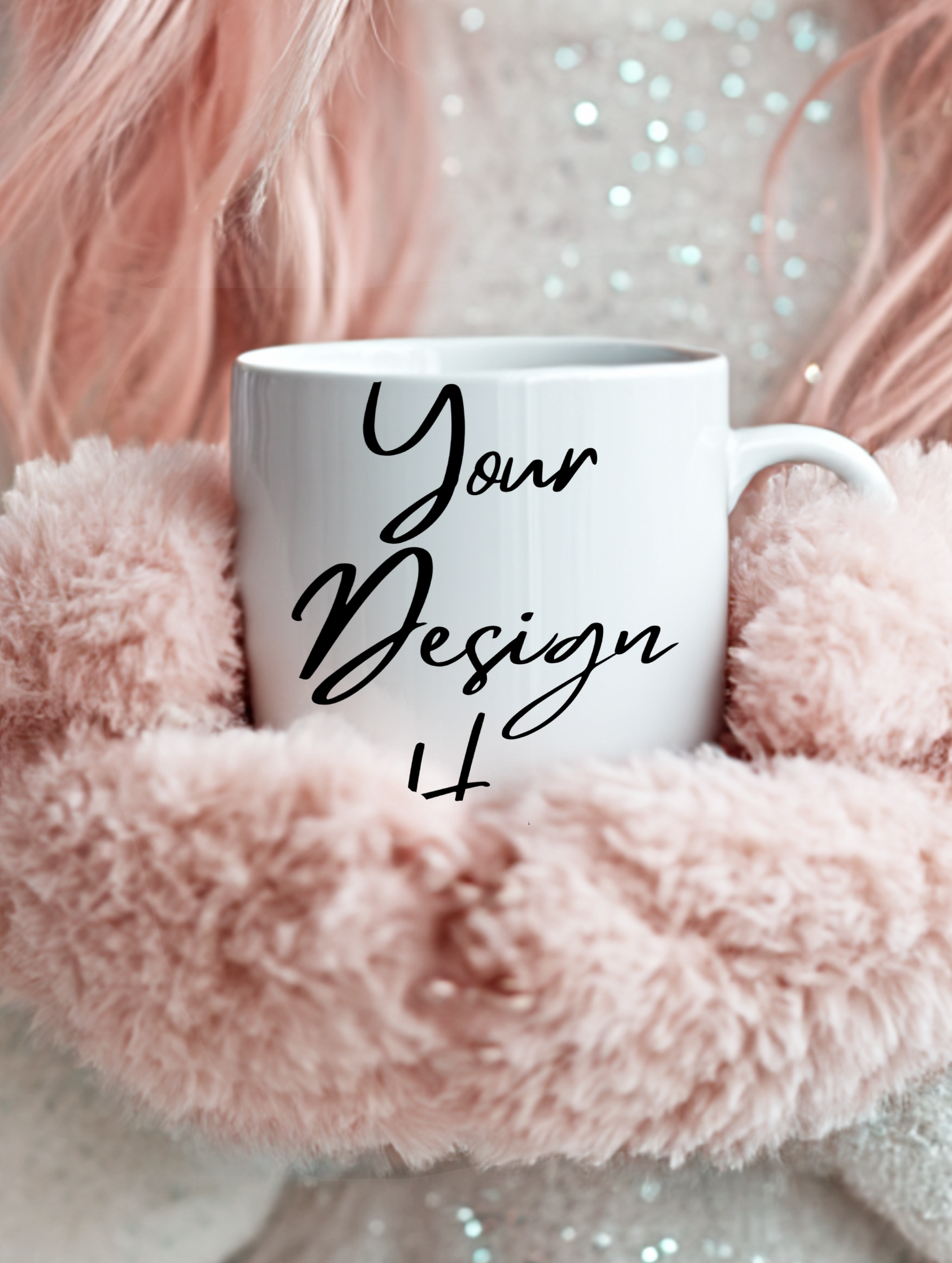 White mug with 'Your Design It' text on a fluffy pink surface