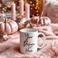 elegant white mug mockup with cozy blanket and flowers, feminine Halloween scene, Canva ready