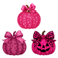 Three pink glittery pumpkins with decorative bows on a white background